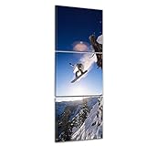 Wandbild Snowboarder im Sprung - 30x90 cm hochkant mehrteilig Leinwandbilder Bilder als Leinwanddruck Fotoleinwand Landschaften Wintersport - Snowboarder springt über eine Klippe