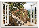 Artland Leinwandbild Wandbild Bild auf Leinwand 100x70 cm Wanddeko Fensterblick Fenster Toskana Landschaft Garten Rosen Balkon Natur T5QC