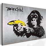 murando - Bilder Banksy Monkey with Banana Gun 120x80 cm Vlies Leinwandbild 1 tlg Kunstdruck modern Wandbilder XXL Wanddekoration Design Wand Bild - Affe mit bananen Pistole Graffiti 030115-40