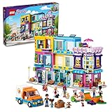 LEGO 41704 Friends Wohnblock in Heartlake City mit Friseursalon und Café, Puppenhaus mit 7 Mini-Puppen, Modellhaus-Bausatz mit Wohngebäuden, Kinderspielzeug